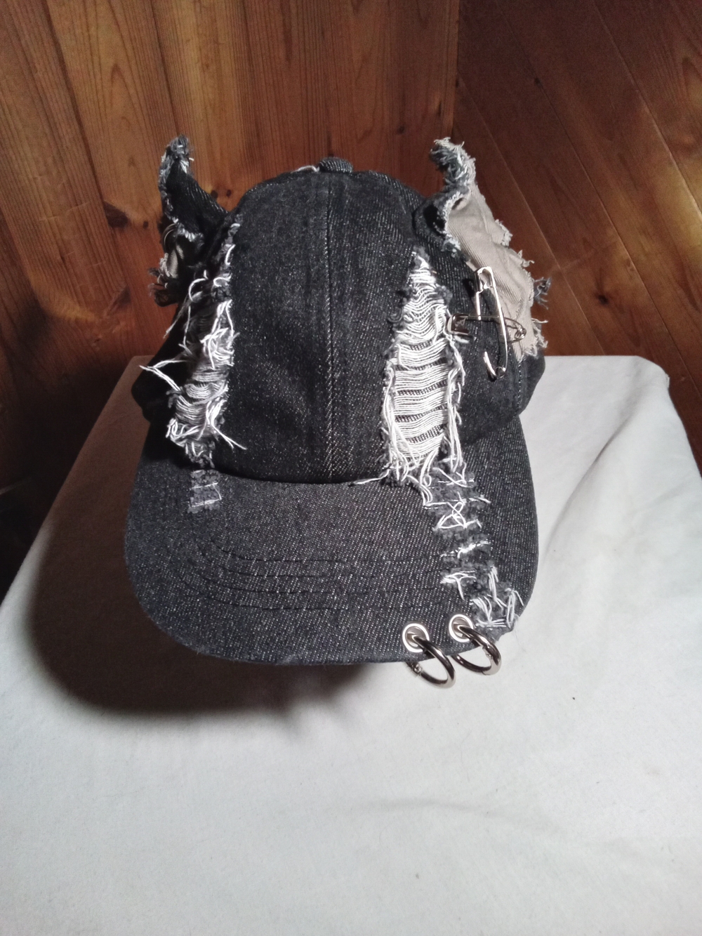 Black Distressed Denim Cap with Silver Ring Accents
